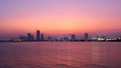 Fotobehang Crimson the newly developed lusail city with for al sadd tower in the background  © MSM