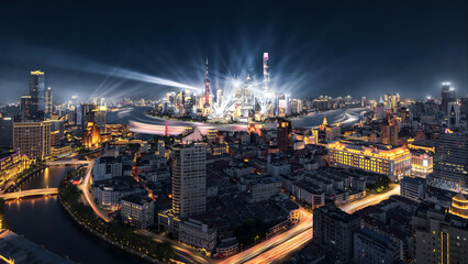 Shanghai Night Skyline with Dramatic Light Beams and Traffic Trails