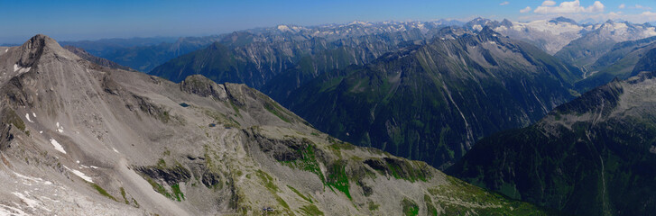View on jagged mountains and glaciers of Zillertal alps on a summer day