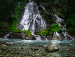 Waterfall Schleierwasserfall in the Osttirol region on a summer rainy day