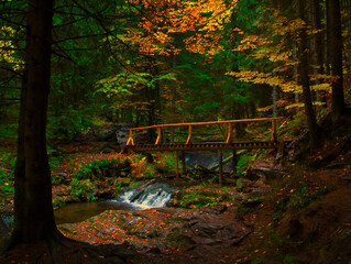 Bridge over river Opava with stones in Jeseniky mountains