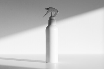 White cosmetic trigger sprayer bottle mockup, shadow overlay, direct sunlight