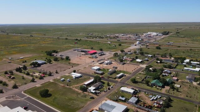 Aerial landscape of small desert road in rural historic US route 66 San Jon New Mexico NM