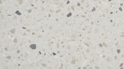 Light gray terrazzo stone texture with natural speckled mineral fragments, modern interior surface background
