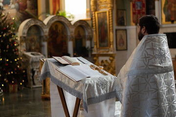 
the priest conducts the service