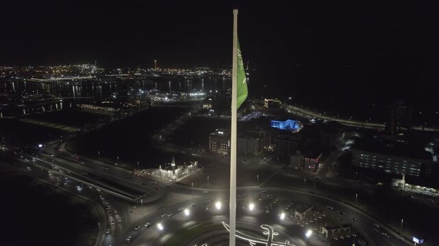 Aerial View Of The Saudi Arabia National Flag Waving In Jeddah shot 