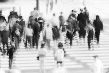 Abstract Black and White Motion Blur of People Crossing City Street
