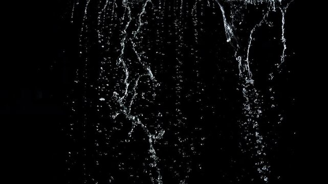 Super Slow Motion Shot of Water Shower . Filmed on High Speed Cinematic Camera at 1000 Frames per Second