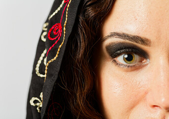 Woman in Headscarf Posing With Smoky Eye Makeup
