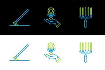 Set line Garden rake in work, and Hand holding flower icon. Vector