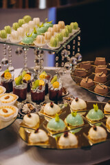 Elegant wedding dessert buffet featuring various sweet treats