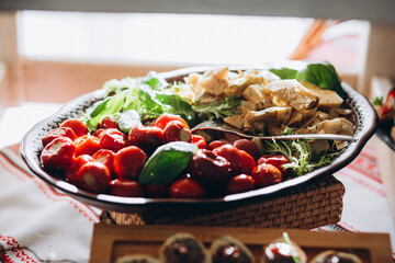 Buffet platter displaying fresh appetizers and gourmet food