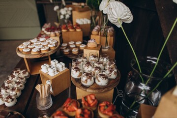 Wedding dessert table offering various sweet treats