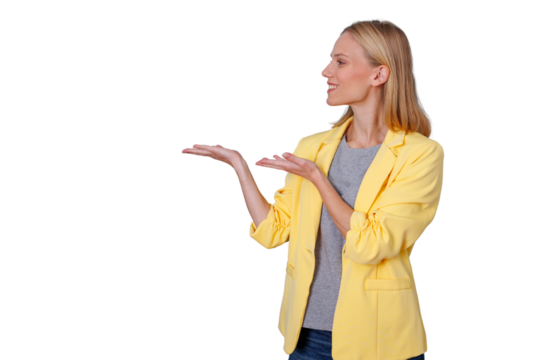 Woman presenting and pointing left with open hands, showing a blank space for content, smiling, transparent background - Powered by Adobe