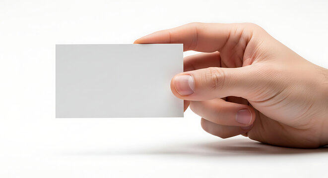 A hand holds a blank business card. The card is perfectly positioned in the hand, ready to convey information