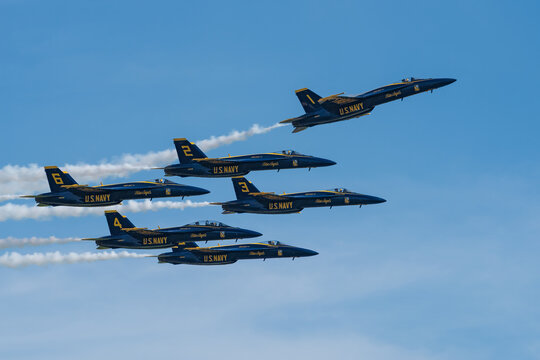 Blue Angels F/A-18 Super Hornets in tight formation over Sacramento Mather Airport during an aerial display. March 23, 2025.