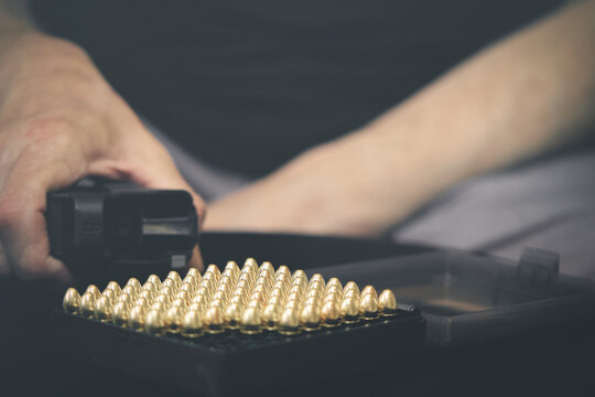 Loading pistol and manipulating with semiautomatic 9 mm pistol details