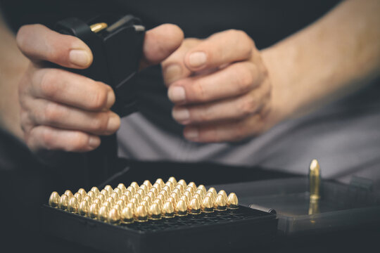 Loading pistol and manipulating with semiautomatic 9 mm pistol details