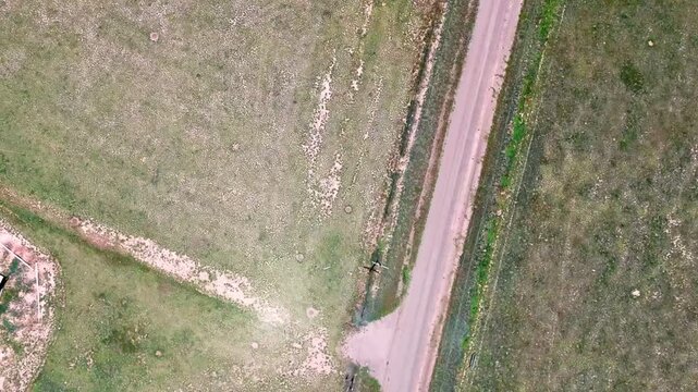 Aerial landscape of desert windmills in rural historic US route 66 Vega Texas Oldham County TX