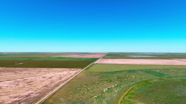 Aerial landscape of desert windmills in rural historic US route 66 Vega Texas Oldham County TX