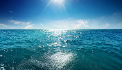 Peaceful Ocean Background Featuring Sparkling Sunlight Reflections