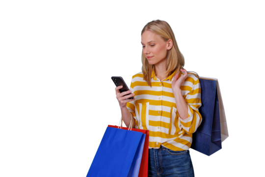 Woman online shopping with smartphone and shopping bags, checking deals or making mobile payment after purchase