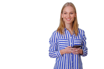 Blonde woman smiling, holding smartphone, looking away, wearing striped shirt, on a transparent background for easy compositing