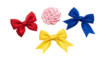 Colorful assortment of satin ribbon bows in red, blue, and yellow with a pink rosette on a white background