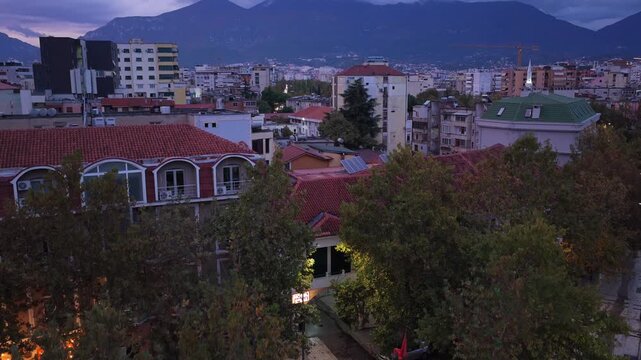 Aerial video reveal of Tirana Cityscape from Elbasani Road with Mount Dajti on the Horizon. 