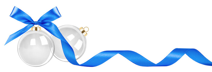 Two transparent Christmas decorations with blue ribbon and bow isolated 