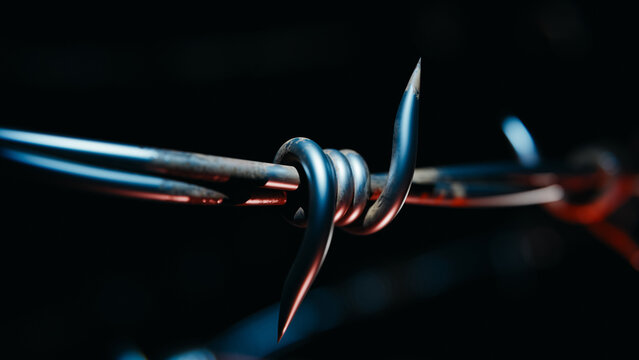 Extreme close-up macro of sharp barbed wire detail on dark background. 3d rendering