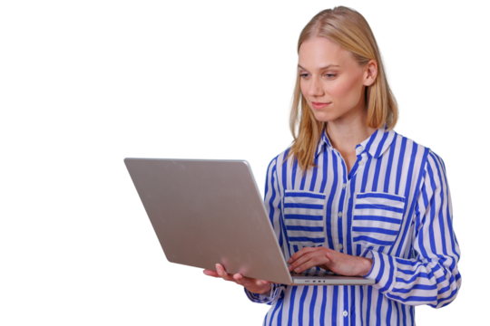 Woman working remotely with laptop, focusing on screen for business productivity and online communication