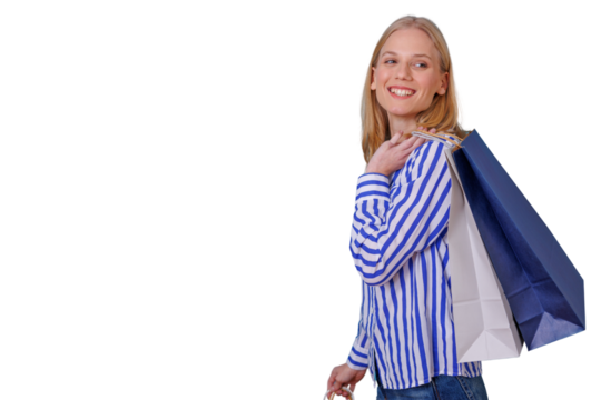 Happy blonde woman carrying shopping bags, enjoying consumerism and retail therapy, walking with a smile, transparent background - Powered by Adobe