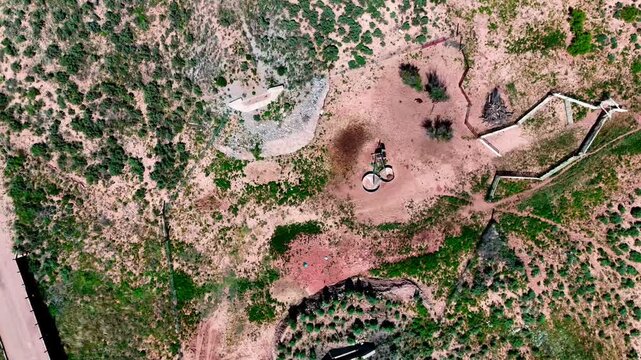 Aerial top down of rural desert road in summer historic US route 66 San Jon New Mexico NM