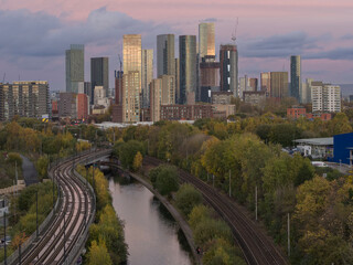 downtown commuter tramway leading into the city skyline