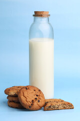 milk and cookies on a blue background