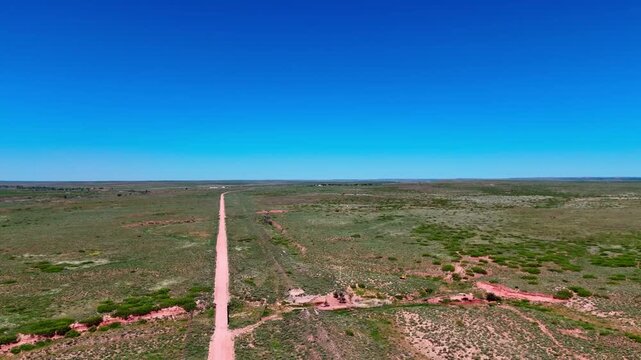 Aerial landscape of rural desert road in summer historic US route 66 San Jon New Mexico NM