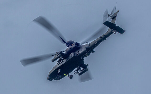 Military tank buster helicopter. Missile and chain gun armed attack chopper.