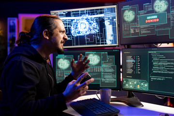 Fototapeta premium Hacker angered by access denied error message while trying to steal valuable data from enterprise networks. Man irked after targeting company servers but getting cyber attacks rejected