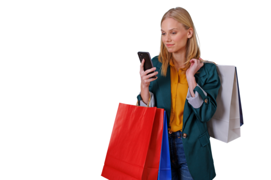 Woman holding shopping bags and smartphone, shopping online or browsing products, consumerism with transparent background