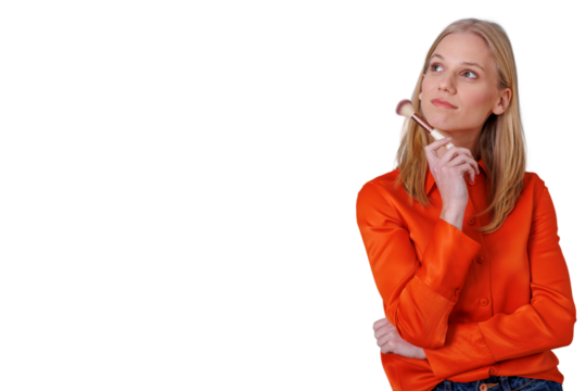 Young woman thinking about beauty routine, holding makeup brush with thoughtful expression, transparent background