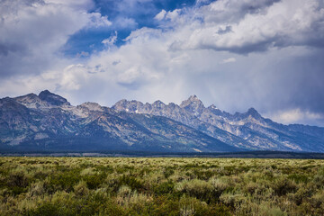 Grand Teton Mountain Range Dramatic Sky and Sagebrush Plains Wyoming