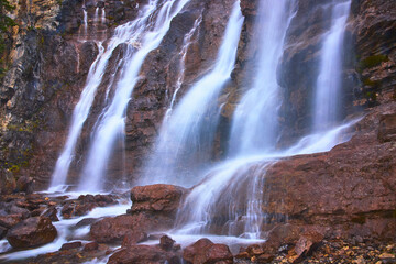 Tangle Falls Waterfall Cascading Over Rocky Cliffs in Jasper National Park Canada