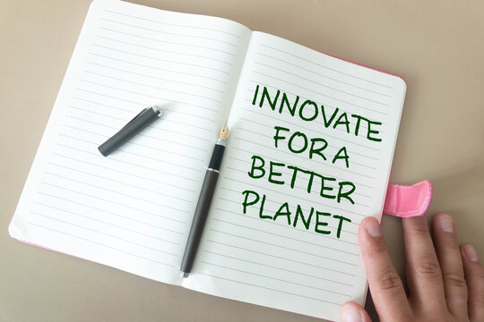 Notepad and the inscription Innovate for a better planet