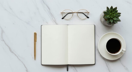 Flat lay of an open blank notebook, elegant gold pen, reading glasses, a cup of black coffee, and a succulent on a clean white marble background.