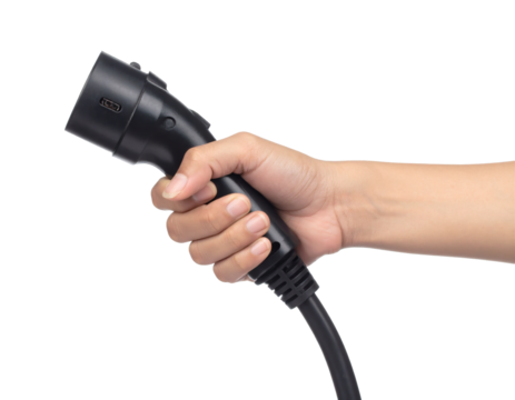 Modern hand holding black electric car charger plug for eco friendly vehicle power, renewable energy future focus