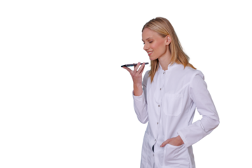 Female doctor recording voice message on smartphone, using mobile technology for communication and remote healthcare