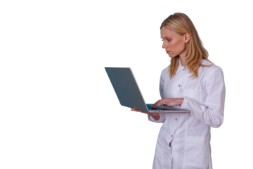 Female doctor or scientist holding a laptop, typing and analyzing data, focused on digital health or research with transparent background