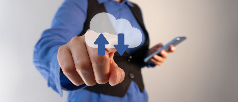 A hand pointing with its index finger: "Business plan" illuminated with a flash of light