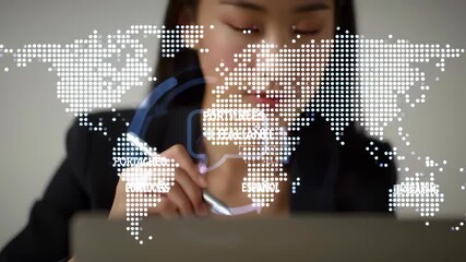 Asian businesswoman working with laptop overlaid with world map and arrows, focused on digital communication in a corporate setting with a neutral background. - Powered by Adobe